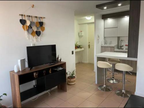 Kuchyň nebo kuchyňský kout v ubytování Cómodo departamento a solo 2 cuadras de Playa Cavancha