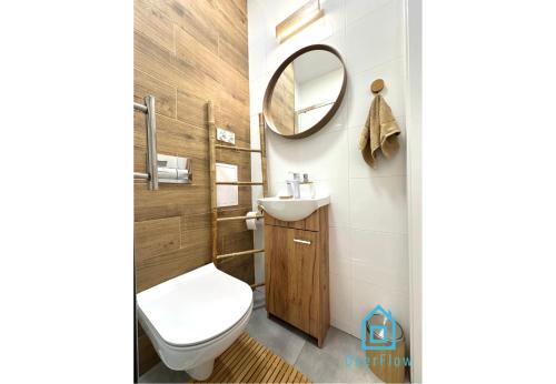 Koupelna v ubytování Bohos Apartment -2 min to City Center Gdynia & Seaside