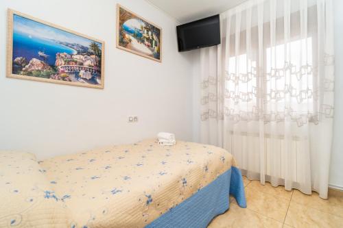 Postel nebo postele na pokoji v ubytování Casa Ianco &Rares
