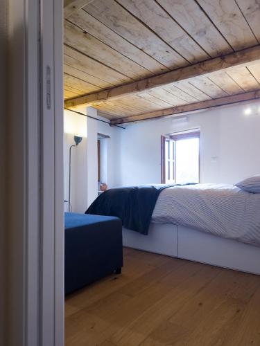 Postel nebo postele na pokoji v ubytování Casa Viglino - Ijan Ospitalità di Frontiera