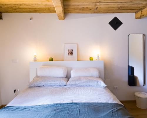 Postel nebo postele na pokoji v ubytování Casa Viglino - Ijan Ospitalità di Frontiera