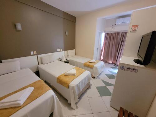 Televisyen dan/atau pusat hiburan di Sandrin Praia Hotel