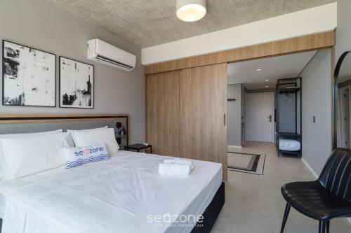Cama o camas de una habitación en Spot Jurere sofisticación junto al mar - SPJ's