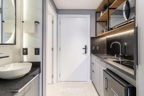 Una cocina o zona de cocina en Spot Jurere sofisticación junto al mar - SPJ's