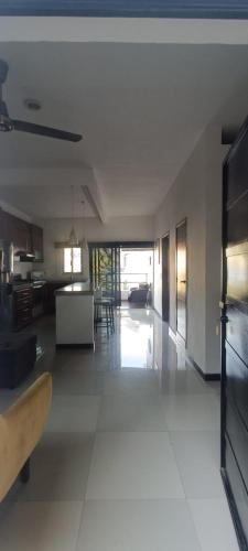 a living room with a kitchen and a dining room at Dep #1 Basilio in Puerto Vallarta