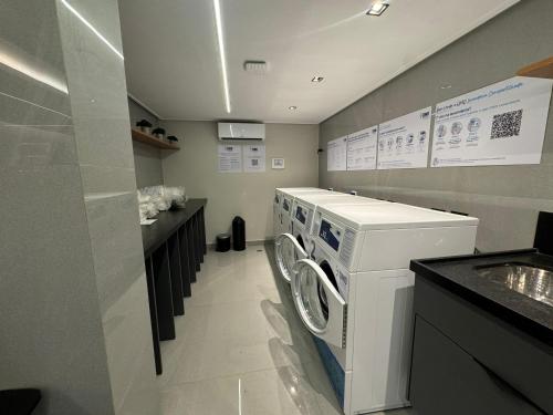 Η κουζίνα ή μικρή κουζίνα στο Flat para 3 Pessoas no Move Tambaú!