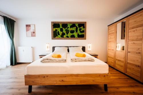 Posteľ alebo postele v izbe v ubytovaní BoRa Apartments