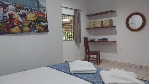Ένα ή περισσότερα κρεβάτια σε δωμάτιο στο Casa Todo Bueno