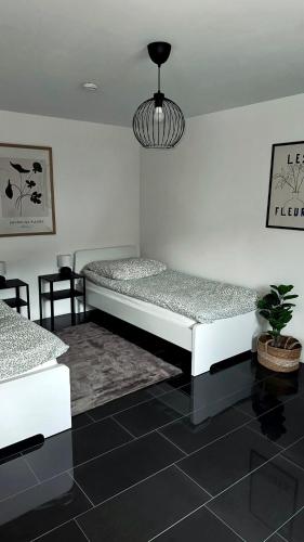 Ένα ή περισσότερα κρεβάτια σε δωμάτιο στο Smart Housing