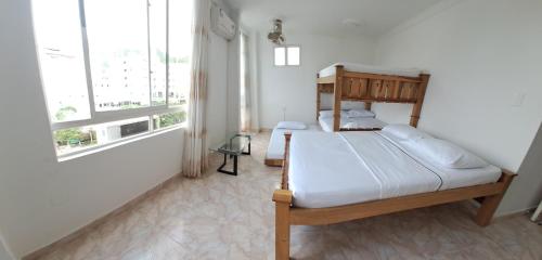 Voodi või voodid majutusasutuse aparta estudio luna azul rodadero 1 toas