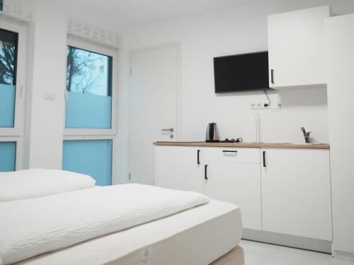 Televisyen dan/atau pusat hiburan di Apartments Issa