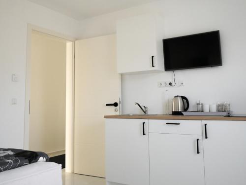 Dapur atau dapur kecil di Apartments Issa