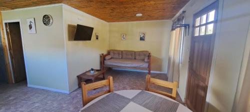 Et tv og/eller underholdning på Cabaña La Cruz del Sur