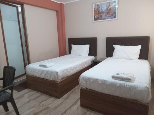 Un ou plusieurs lits dans un hébergement de l'établissement CARDOS HOSTAL