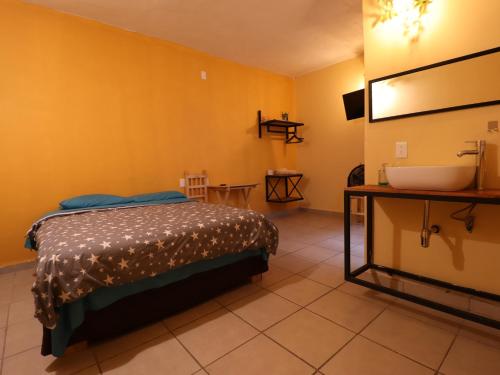 Postel nebo postele na pokoji v ubytování Casa Corazon Centro