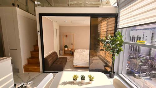 a view of a living room from a house at Majestic Seoul Stay Central in Seoul
