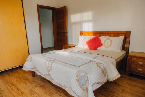 Giường trong phòng chung tại Bellena