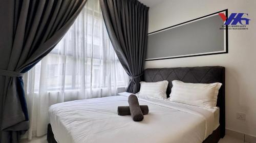 Ένα ή περισσότερα κρεβάτια σε δωμάτιο στο Arena Suite 3BR KLIA Sepang