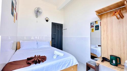 Ένα ή περισσότερα κρεβάτια σε δωμάτιο στο Villa Đà Lạt Trung Nghĩa