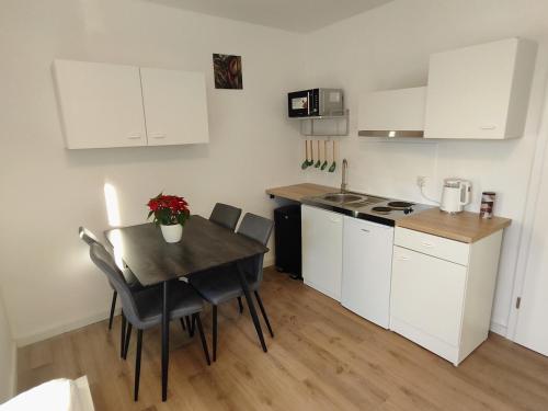 Η κουζίνα ή μικρή κουζίνα στο ACR-Accommodations, Gästezimmer, Monteurunterkünfte