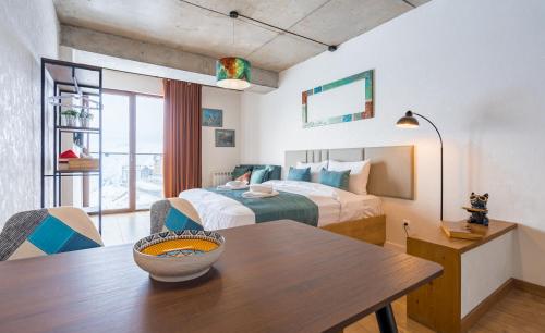 Ένα ή περισσότερα κρεβάτια σε δωμάτιο στο Winterfell in New Gudauri