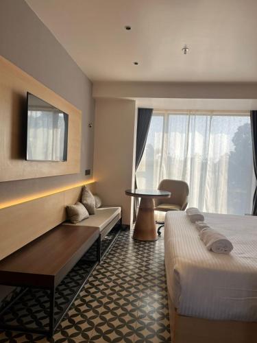TV a/nebo společenská místnost v ubytování Hotel Four Natives