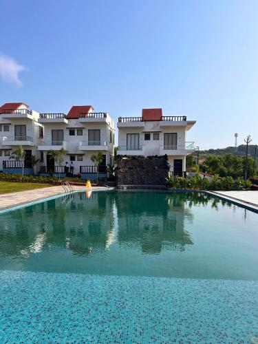 Bazén v ubytování Baywatch Resort Bhogave Beach nebo v jeho okolí