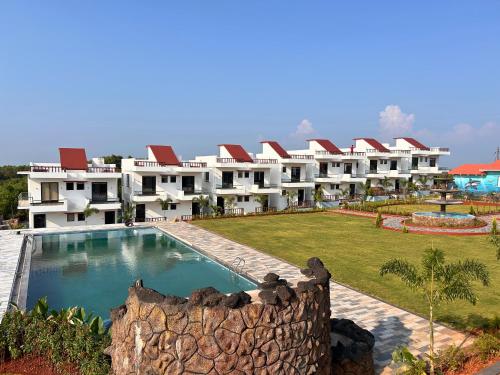 Bazén v ubytování Baywatch Resort Bhogave Beach nebo v jeho okolí