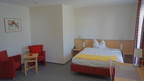 Postel nebo postele na pokoji v ubytování Andi´s Steakhüsli & Hotel