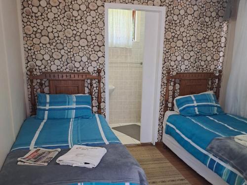 Katil atau katil-katil dalam bilik di Willowdene Bed and Breakfast
