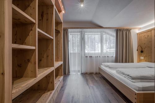 Cama o camas de una habitación en Appartamenti Residence Ada