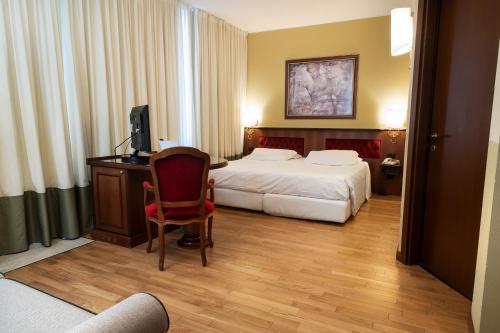 Postel nebo postele na pokoji v ubytování Hotel Alga
