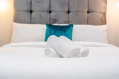 Una cama o camas en una habitación de Mc Leans