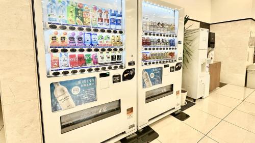 a vending machine filled with lots of drinks in a store at Toyoko Inn Kawaguchi Ekimae in Kawaguchi
