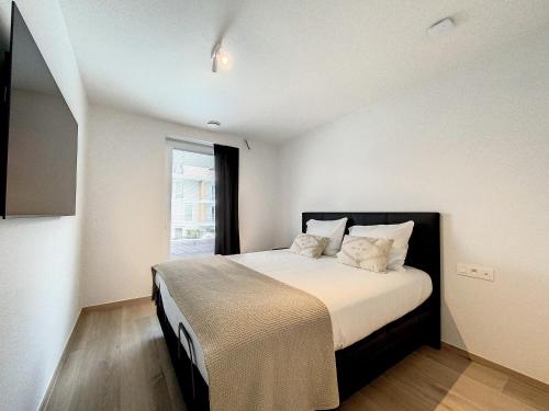 Voodi või voodid majutusasutuse Sailors'Park - Appartement 'Villa ORION' - Nieuwpoort toas