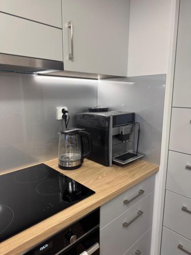 Η κουζίνα ή μικρή κουζίνα στο Apartament Augustów ,Arnikowa