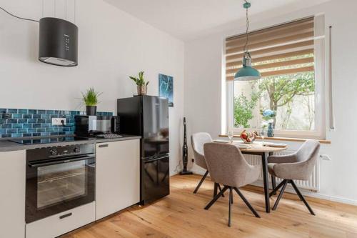 Kuchyň nebo kuchyňský kout v ubytování Studio Loreley am Rhein, moderne & vollausgestatte 40qm, Küche, Netflix, WM