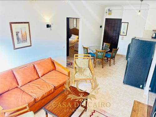 a living room with a couch and a table at Casa Do Cairo-Sharm Alsheikh in Sharm El Sheikh