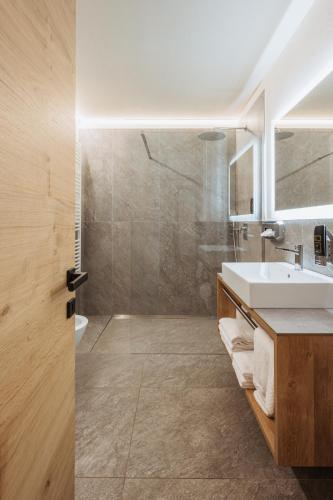 Koupelna v ubytování Residence Piz Aot