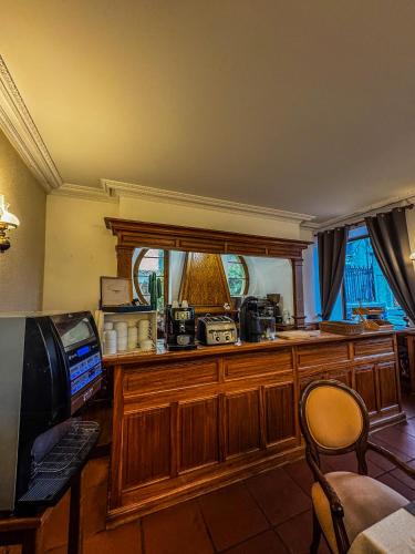 Kuchyň nebo kuchyňský kout v ubytování Grand Hôtel de France