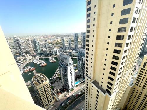 an aerial view of a city with tall buildings at ROYAL BEACH RESIDENCES 2 in Dubai