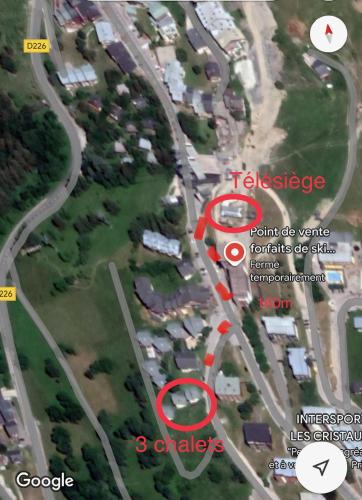 une carte d'un parking avec des maisons et des voitures dans l'établissement Chalet Chamois Domaine des Arcs sauna, à Peisey-Nancroix