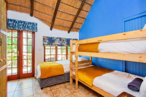 Ένα ή περισσότερα κρεβάτια σε δωμάτιο στο The Villa Manor & Spa
