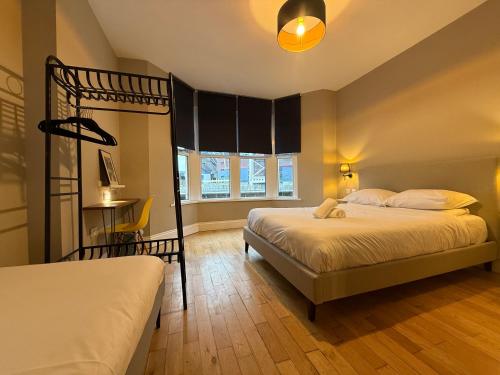Llit o llits en una habitació de The Riverhouse