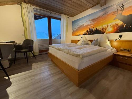 Postel nebo postele na pokoji v ubytování Hotel Steiger