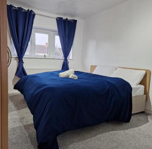 Ένα ή περισσότερα κρεβάτια σε δωμάτιο στο Cosy large double room