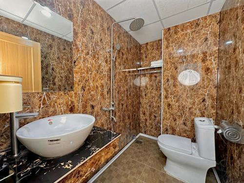 Koupelna v ubytování Corgi House Beachstay Danang
