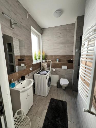 Kúpeľňa v ubytovaní Apartamenty Cieplicka 20a
