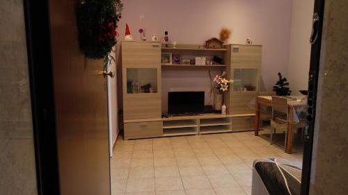 A television and/or entertainment centre at Appartamento La Chiesetta