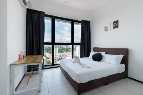 Postel nebo postele na pokoji v ubytování Seaview Infinity Pool 2BR 2CP 8Pax Urban Suite 251